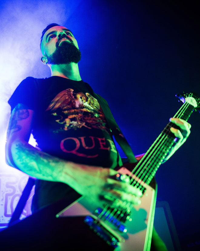 Low angle view of Dopelord guitarist performing in London