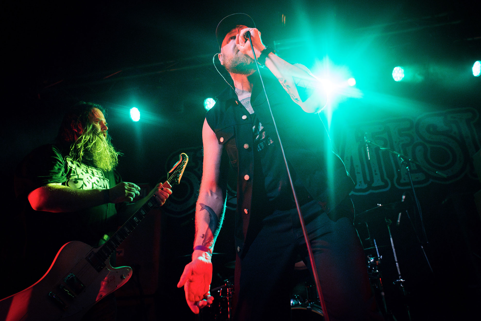 Low angle view of Greenleaf singer and guitarist performing in London