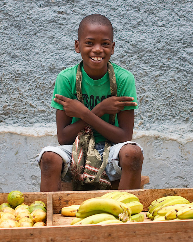 Young boy selling fruit in Cuba